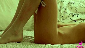 Lynn in white stockings teases and fucks her wet pussy with glass dildo until orgasm.