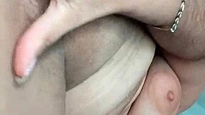 the sucia enmascarada brunette with big natural tits fingers her tight wet pussy in homemade solo play. she moans dirty talk while orgasming on webcam