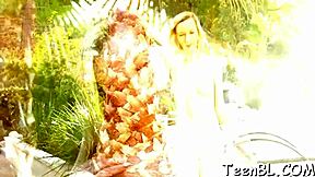 blonde teen performs blowjob and masturbation in erotic shaved hairless setting