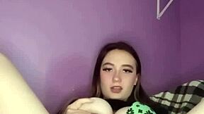 Hey, this young amateur teen 18+ pulls panties aside to rub her puffy pussy gently