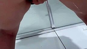 teen bent over squirting pee in bathroom