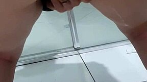 teen bent over squirting pee in bathroom