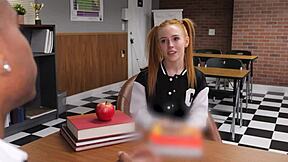 In a tense school moment, petite redhead Madi Collins eagerly swallows the principal's big black cock to escape her suspension troubles