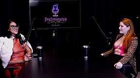 Gostosa ruiva gets naked showing huge tits after interview by nude presenter Bia Hot and Natasha Fiore in see-through lingerie.