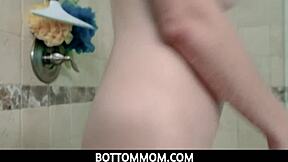 American stepmom Artemisia Love gives blowjob and fucks in bath with big boobs exposed