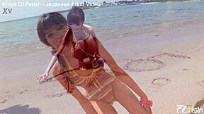 skinny japanese chick poses in bikini during outdoor photoshoot on the beach with close up shots