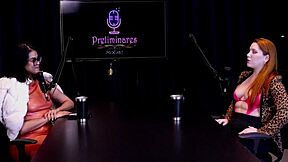 Gostosa ruiva gets naked showing huge tits after interview by nude presenter Bia Hot and Natasha Fiore in see-through lingerie.