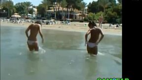 Teens show great tits on the beach in free teen beach video.