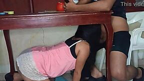 the latina teen 18+ hides under the table giving a homemade blowjob to her lover