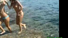 Teens show great tits on the beach in free teen beach video.