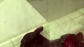 Amateur petite ebony rides huge BBC torso dildo while moaning in solo action.