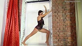 Sexy brunette teen 18+ Tonya Bellucci shows off her flexible gymnast body. She spreads legs wide in acrobatic nude poses.