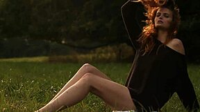 czech teen shows off her young tits in a glamorous outdoor wind-swept video scene