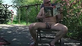 Teen neighbor teases old man into outdoor sex in his backyard garden.