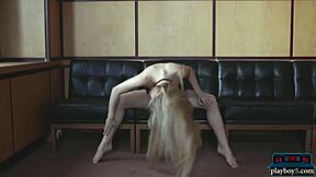 This tiny Russian teen blonde does a hot striptease in clothes that get ripped while posing with her shaved pussy