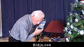 An old grey man gets a real doll as a Christmas gift. He eagerly fucks her in stockings with hardcore blowjob and doggystyle action.