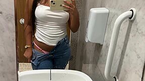 I couldn't hold back my horniness so I'm masturbating in the shopping mall bathroom right now