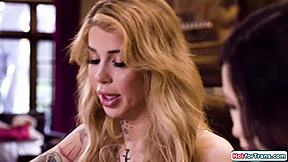 Busty tgirl Gracie Jane licks and gets oral from petite assistant.