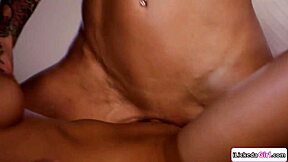 Lesbian stepdaughter gently caresses and licks the busty stepmom's intimate area in tender moment.