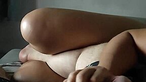 Amateur Asian teen assists stepson with handjob while watching cartoons, as husband is away and stepdaughter masturbates at friend's house, teasing until orgasm in uncensored scene.