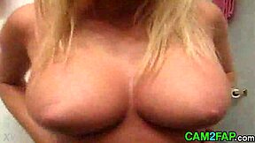 Think this blonde teen's huge tits are real on webcam?