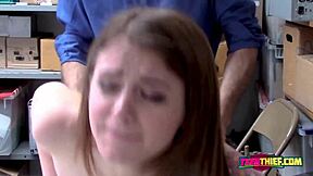 Rosalyn grimaces while big cock stretches her tight cunt in office.