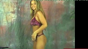 busty christina dances in a purple bikini