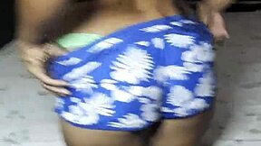 Karely shows off her green thong.