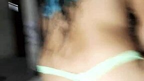 Karely shows off her green thong.