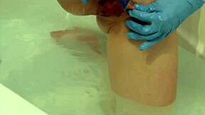 feel these rubber gloves on my shaved pussy lips while i shave everything smooth