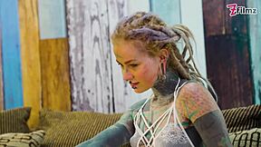 Petite tattooed slut in fishnets and high heels spreads juicy asshole for solo anal dildo fucking and gaping