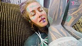 Petite tattooed slut in fishnets and high heels spreads juicy asshole for solo anal dildo fucking and gaping