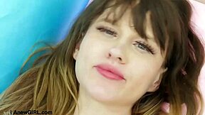 This sexy teen 18+ model poses on the sofa revealing her alluring body during the photoshoot