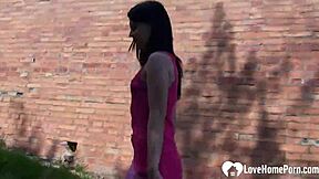 Teen babe walks outdoors showing small tits