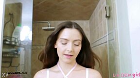 Fierce brunette takes a shower after casting interview on sofa.