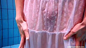 redhead marketa teases in white dress by the pool