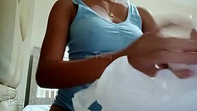 young asian girl feels so content and relaxed while enjoying her instant noodles at home