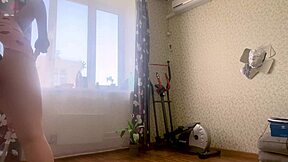 Hey, watch this horny blonde showing her pussy and fucking a dildo between big boobs in bedroom with toys