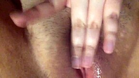 Young 18 year old babe gets horny alone. She fingers her wet pussy and fucks herself to orgasm.