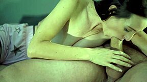 Hot blue-eyed brunette gives blowjob to thick cock and swallows cum