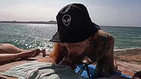 In a deserted beach, naughty girls engage in a hot orgy with kissing and cunilingus.