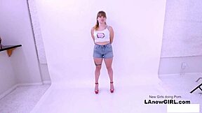 lesbian stylist seduces straight girl on sofa during photoshoot