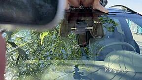 Crazy girl pees on car roof for windshield cleaning