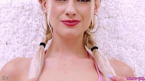 Radiant blonde girl showcases her sexy body during a casting interview on the sofa