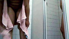 real couple enjoys wet bathroom shower together at home.