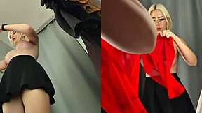 I spy upskirt on naked blonde with big tits trying see-through clothes in changing room.