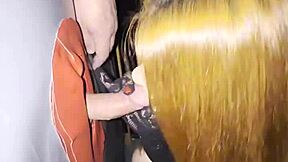 this cute brunette and redhead took turns at gloryhole fisting and deepthroat action