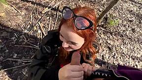 ginger beauty with red hair delivers an extreme public blowjob in the woods to a stranger