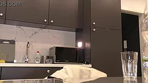 Blonde wife in kitchen teases with sheer black pantyhose and removes panties?