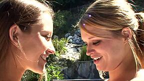 Dani Daniels engages Heather Starlet in a close moment after their yoga practice session